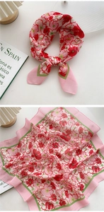 Detail of pink floral cotton linen square scarf with delicate floral print and soft texture