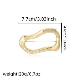 Detailed size map of the gold irregular brooch showing 7.7cm length and 20g weight