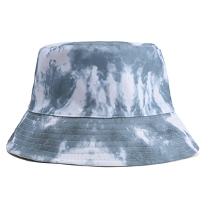Detailed view of reinforced stitching on the brim of blue and white tie-dye bucket hat
