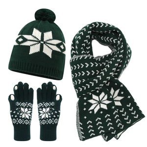 Winter knitted set with hat, scarf and gloves in dark green with white snowflake patterns