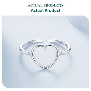 Macro shot of S925 sterling silver open ring featuring a minimalist hollow heart design