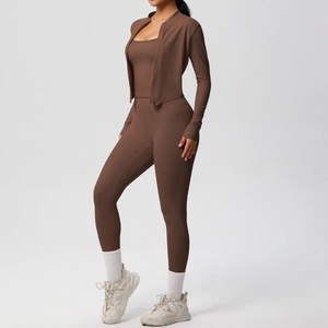 Three-piece dark brown yoga set featuring zipper jacket, tank top and high-waist leggings
