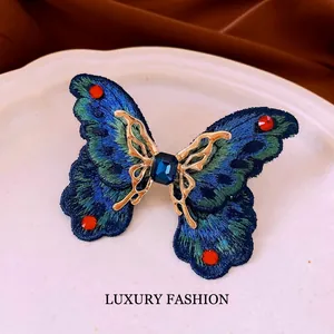 Exquisite knitted butterfly open ring with rhinestones and blue crystal for women
