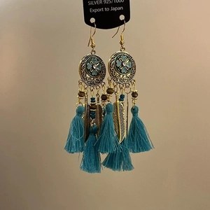 Bohemian tassel earrings with turquoise floral enamel and silver 925 feather charms