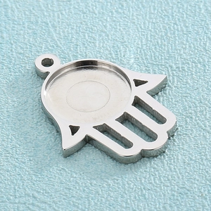 Detailed silver Hamsa hand charm base with round gemstone setting for DIY jewelry