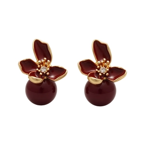 Vintage floral pearl stud earrings with burgundy enamel petals and gold-plated metal borders