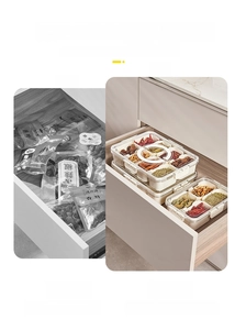 Kitchen drawer organizer with clear food-grade spice containers and sealed lids