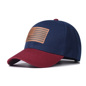 Classic blue and red baseball cap with brown leather USA flag patch on the front