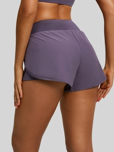Short de course 2-en-1 violet pour femmes avec poches latérales et taille élastique