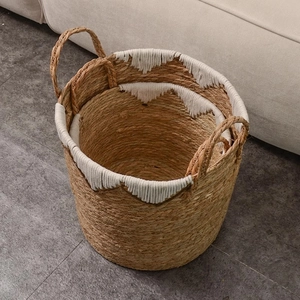 Natural woven storage basket set with white lace trim and dual handles for home organization
