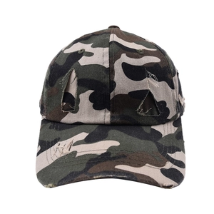 Retro distressed camouflage baseball cap with washed finish and torn detailing