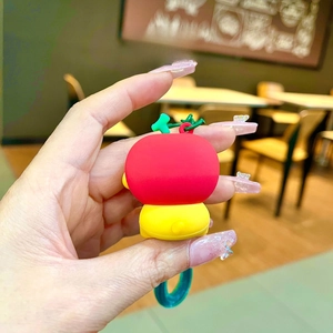 Back view of a cute cartoon dog keychain with colorful silicone hat and teal hook
