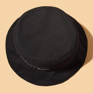 Fashionable black cotton sun hat with white PRETTY GIRL embroidery in top view