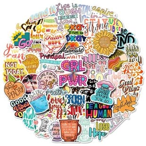 Close-up of assorted inspirational vinyl stickers with colorful designs and motivational text