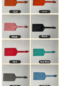 Detail showing eight colors of thick PU leather luggage tags with gold heart plane patterns
