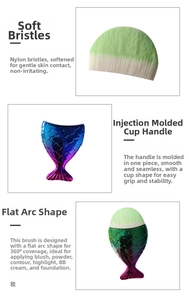 Detailed view of mermaid tail makeup brush with soft gradient bristles and scale texture