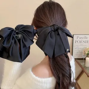 Elegant large black satin bow claw clip for women's daily hair styling accessories