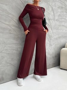 Burgundy Y2K two-piece set featuring off-shoulder long sleeve top and wide leg pants