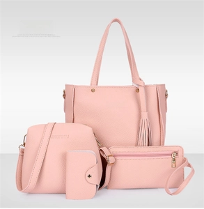 Pink lychee texture handbag set including tote bag, crossbody bag, wallet, and key pouch