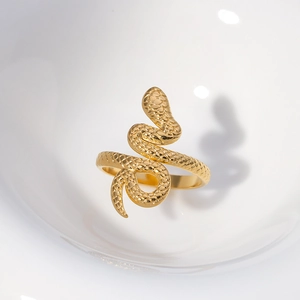 Detailed view of the gold snake ring showing intricate scale textures on stainless steel