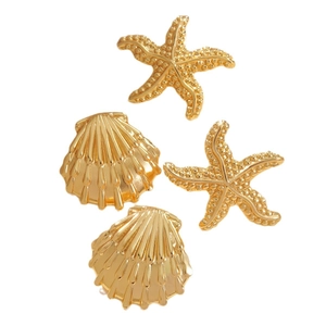Golden starfish and scallop seashell earrings set in minimalist polished stainless steel