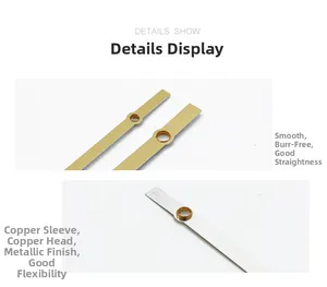 Macro detail of metal quartz clock needles with copper sleeves in gold and silver finish