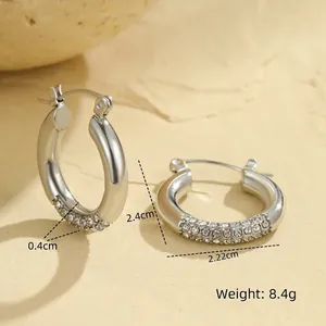 Detail showing dimensions of silver hoop earrings with inset sparkling cubic zirconia