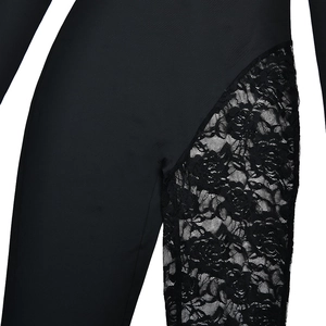 Detail shot of black bodycon bodysuit with floral lace side panel and smooth fabric texture