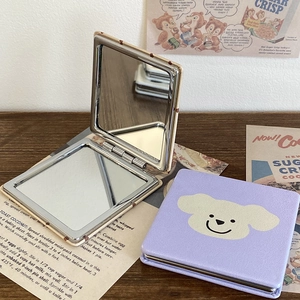Portable folding double-sided makeup mirror with cute cartoon puppy design, PU leather case.