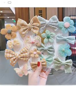 Kids hair clip set with lace butterflies and fabric flowers on white display card