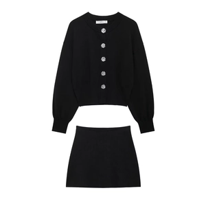 Elegant black knit two-piece set featuring a round neck cardigan and mini skirt