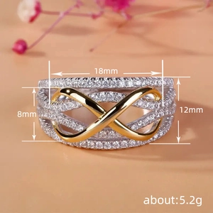 Modern multilayer silver ring with pavé zircons and a central golden infinity symbol