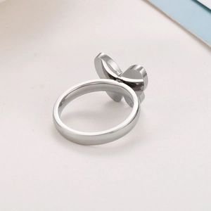 Macro detail of polished silver butterfly ring made of durable stainless steel