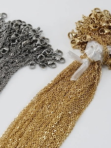 Polished gold and silver 18K stainless steel O-link chains with lobster clasps