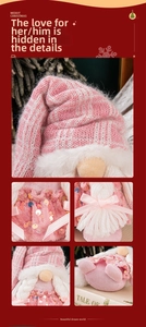Close-up of pink Christmas gnome with sequins, knitted hat and white faux fur beard detail