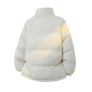 Back view of cream white puffer jacket featuring a high collar and wide quilted panels