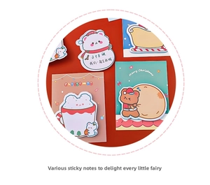 Close-up of Christmas themed sticky notes featuring bear, Santa hat and sock patterns