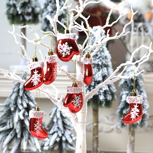 Christmas tree ornaments set featuring red painted gloves and stockings with white snowflake patterns