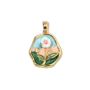Macro view of a 18k gold hexagon pendant with enamel floral garden and zircon inlay