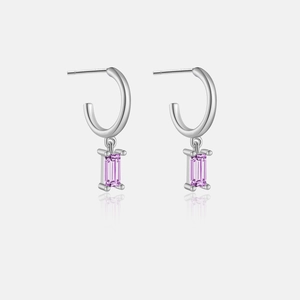 Detail of S925 silver C-shaped earrings with purple rectangular gemstones in prong setting