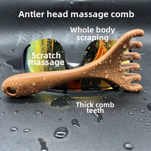 Macro shot of an antler-shaped massage comb for scalp therapy and neck relaxation
