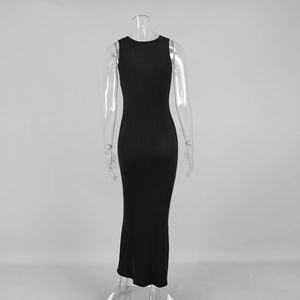 Detail shot of black ribbed knit dress showing vertical texture and stretch fabric
