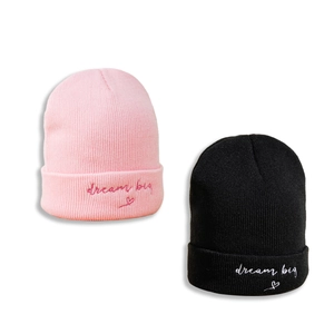 Pink and black knit beanies with Dream Big heart embroidery for winter warmth