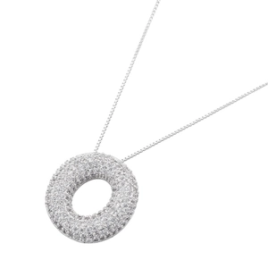 Macro detail of silver circle pendant with pavé set crystals on a thin box chain