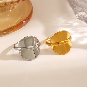 Minimalist geometric 18K gold and silver stainless steel rings in deconstructed design