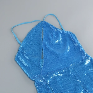 Detailed view of the blue sequin fabric and delicate spaghetti straps on this formal dress