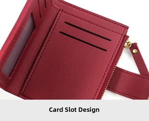 Detail view of burgundy leather wallet interior featuring card slots and coin pocket