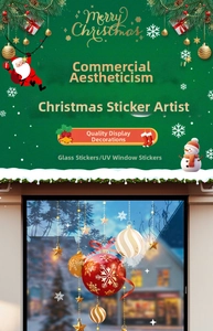 Détail de stickers UV de Noël pour vitres avec boules rouges, étoiles d'or et flocons