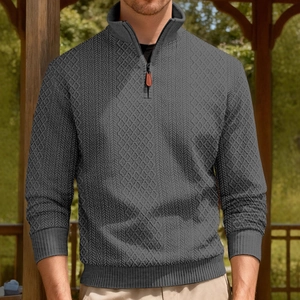 Men's dark grey quarter-zip sweatshirt with textured waffle pattern and stand collar