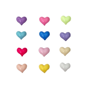 Colorful macaron candy heart resin nail art charms in a 12-piece grid layout